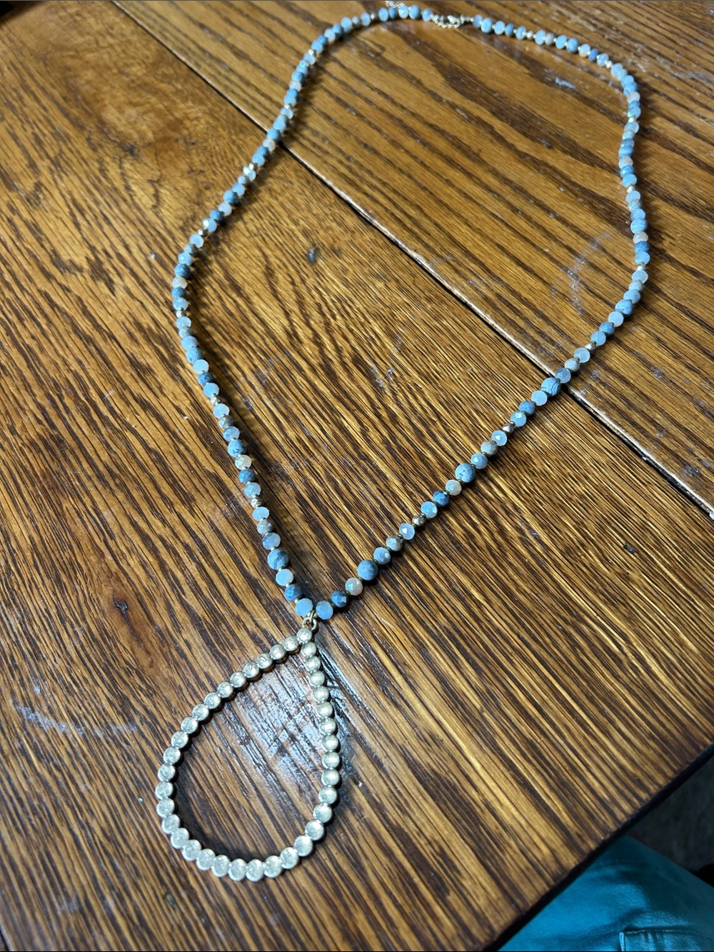 Delicate Gold Teardrop Necklace with Light Blue Beads